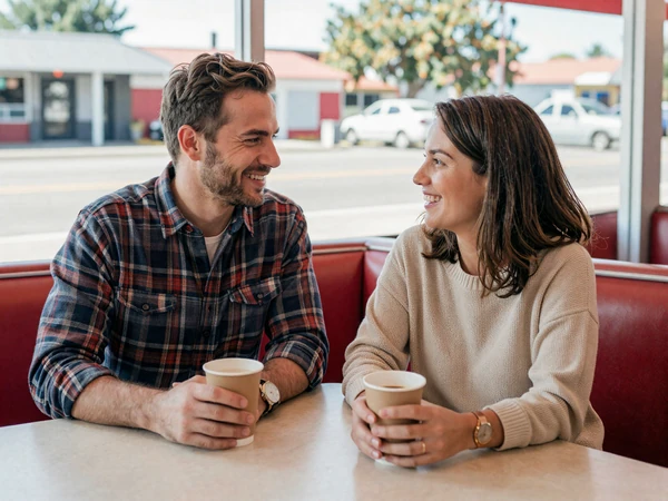 James and Melissa, a trucker dating success couple at a roadside diner