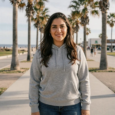 Sofia, 34, a brunette woman in a hoodie at a California beach park, verified trucker dating profile
